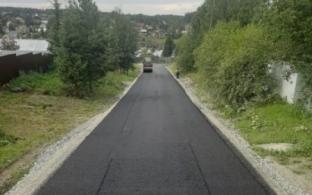 В деревне Каменка приступили к асфальтированию дороги