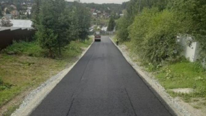 В деревне Каменка приступили к асфальтированию дороги
